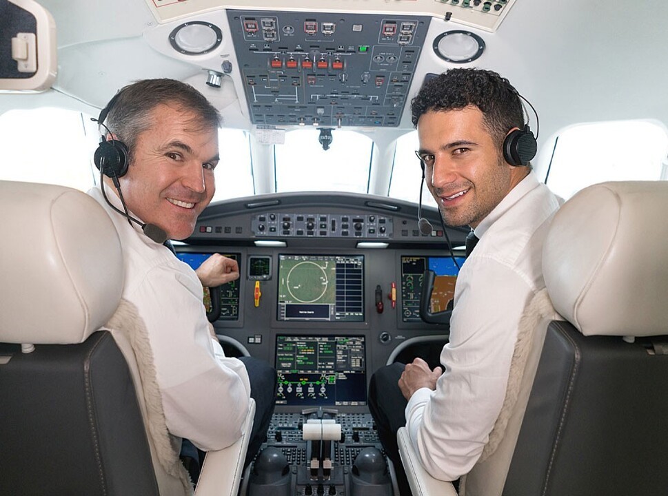 Two pilots flying a private jet
